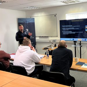 Image of man teaching drone training class.