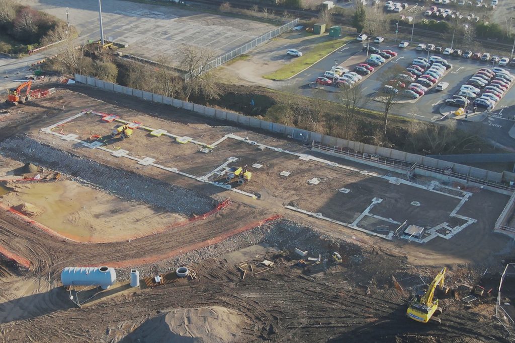 Drone image taken of construction site in a sunny location.